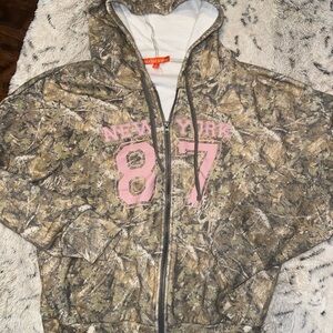 Y2k Camo zip up with light pink detailing NWOT